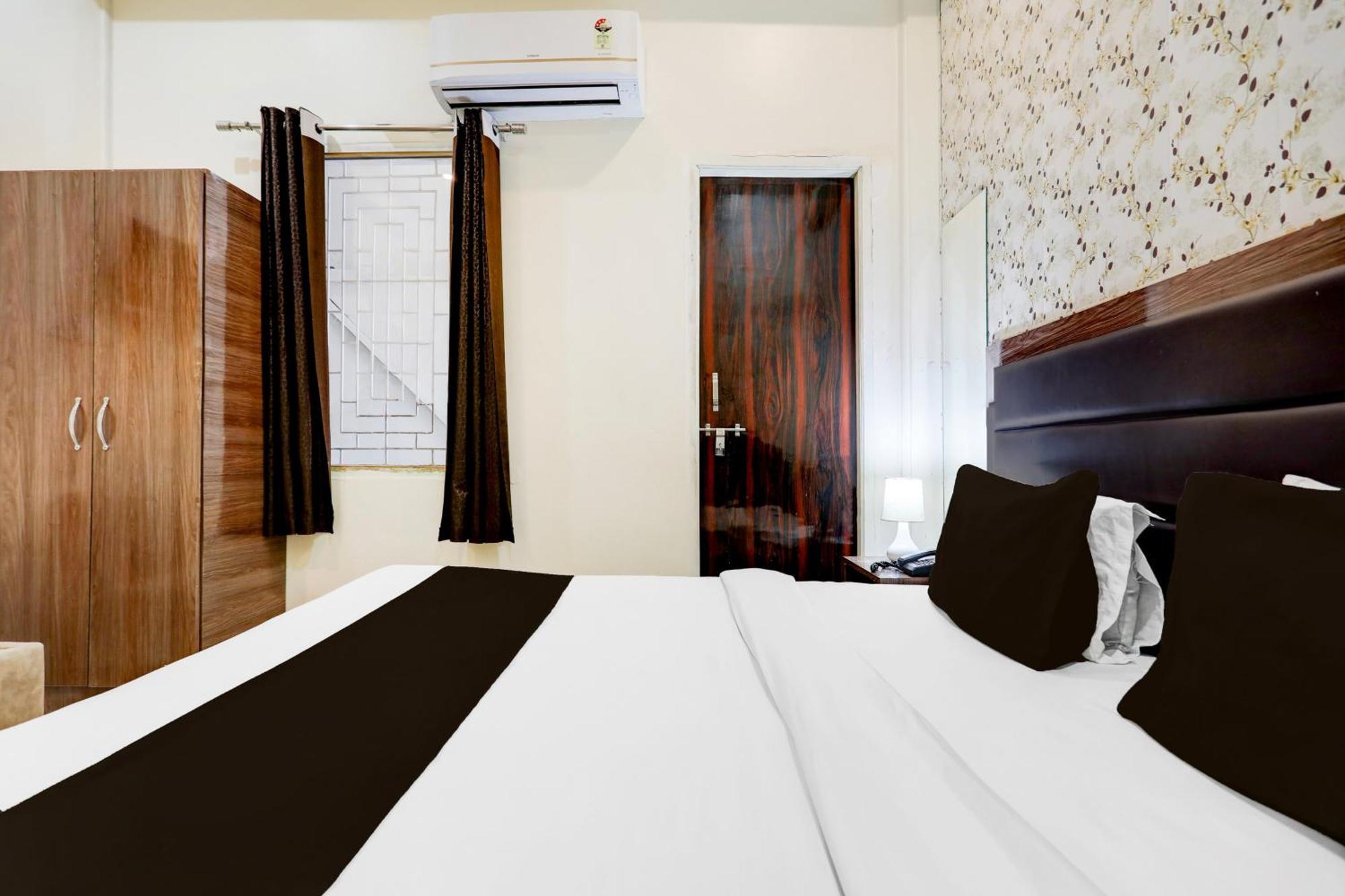 Super Hotel O Sankat Mochan Gandhi Nagar Kakarmatha Exterior photo